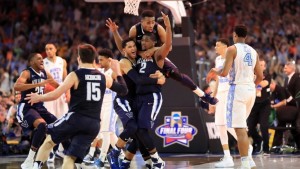 Kris Jenkins celebrates with his Villanova teammates after his buzzer-beating three-pointer (Getty Images)